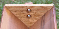 Hardwood Triangles hold the deer feeder together